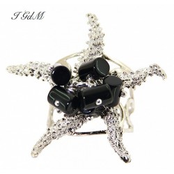 Starfish and obsidian ring